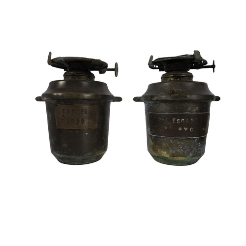 195 - A pair of copper and brass yacht cabin oil lamps from the 'Escape', 1939: glass chimneys over copper... 