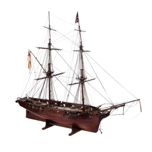 406 - A 19th century scale model of a 16 gun sixth rate sloop: standing rigged and flying a white ensign a... 