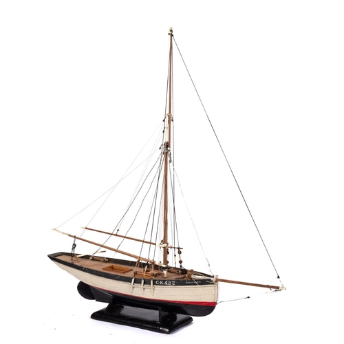 412 - A scale model of the Essex fishing smack CK 482 'Kingfisher': standing and running rigged over a pla... 