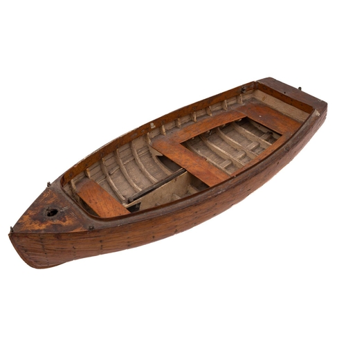 417 - An early 20th century apprentice model of a clinker built dinghy:  plank and pinned hull with  brass... 