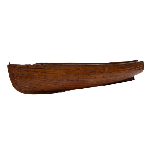 417 - An early 20th century apprentice model of a clinker built dinghy:  plank and pinned hull with  brass... 