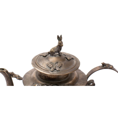 234 - A Chinese white-metal and jade mounted teapot and cover with rabbit finial, the body applied with bi... 