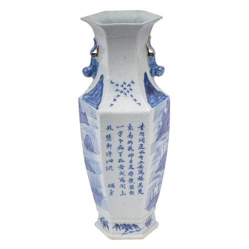 48 - A Chinese blue and white hexagonal section vase with lion-dog handles, painted with a mountainous la... 