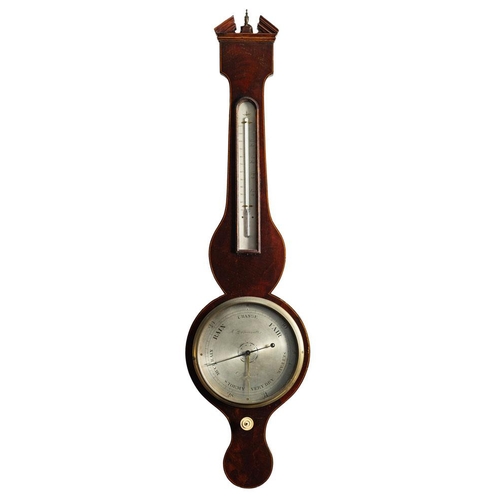 509 - A mahogany wheel barometer the eight-inch round silvered dial engraved with usual barometer markings... 