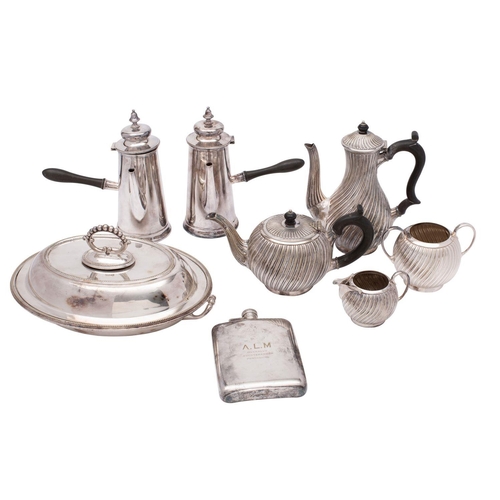 2009 - A collection of silver plated items comprising an electroplated four-piece tea and coffee set with w... 