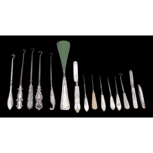 2035A - A collection of five silver handled button hooks, various dates and maker, together with a silver ha... 