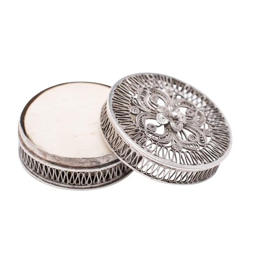 2102 - An English silver filigree gaming counter box, un- marked possibly 18th century, of circular form, w... 