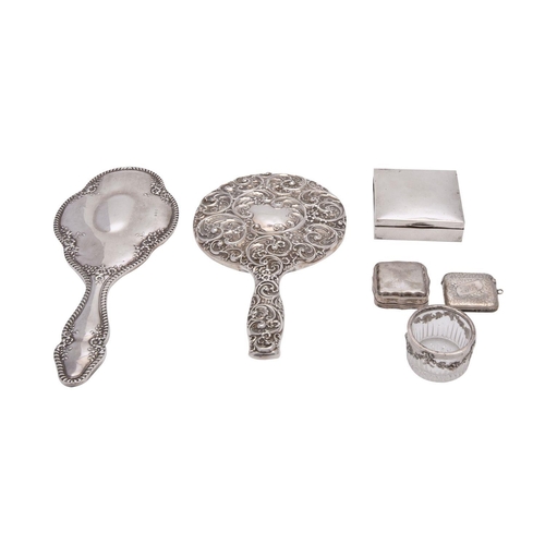 2123 - A small group of silver items to include;- two silver mounted embossed hand mirrors stamped Sterling... 