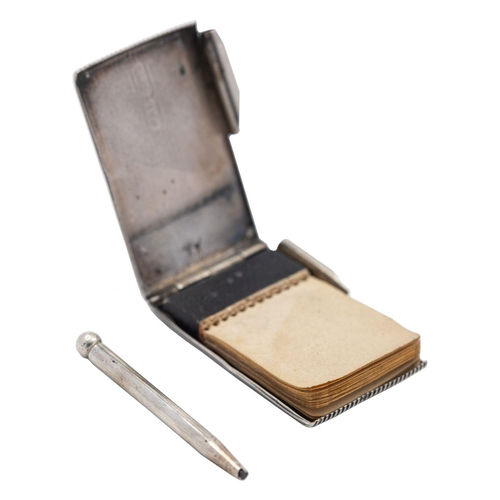 2146 - A novelty silver notepad and pen, probably American, stamped Sterling G&G, of rectangular reeded for... 