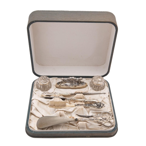 2149 - An early 20th century American Art Nouveau silver lady's dressing table set, stamped Sterling, silve... 