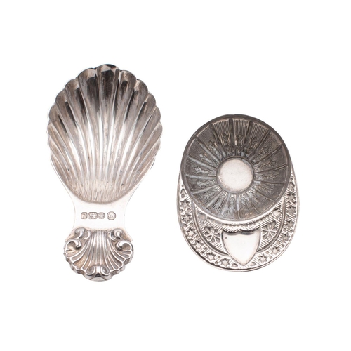 2153 - A Jockey Cap pattern caddy spoon, maker Francis Howard, Sheffield 1975, together with another shell ... 