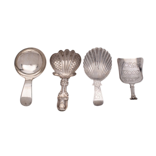 2156 - A small collection of early 19th century silver caddy spoons, to include a shell bowl, maker John Li... 