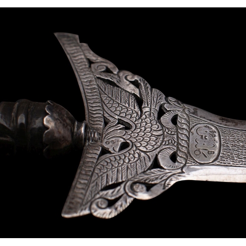 2169 - An Indonesian silver paper knife, in the form of a kris with buffolo horn handle, stamp in Arabic sc... 