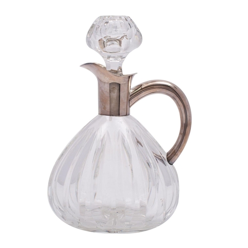 2183 - A German silver and glass claret jug, stamped 835, of pear-shaped outline with plain mount, open scr... 