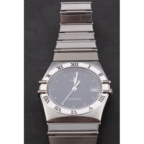 2319 - Omega, Constellation, a gentleman's stainless steel wristwatch the black dial with raised dates at e... 