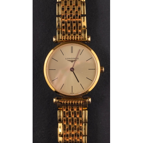 2329 - Longines La Grande Classique, a lady's  gold-plated wristwatch the dial with baton numerals and hand... 