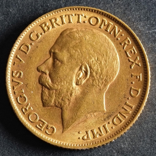 2444 - A 1913 Georgian Gold Sovereign.