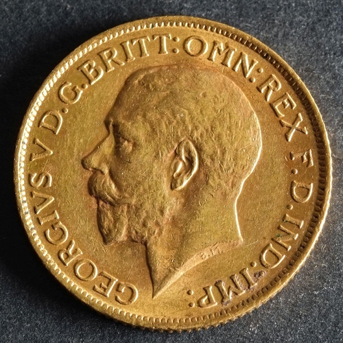 2445 - A 1913 Georgian Gold Sovereign.