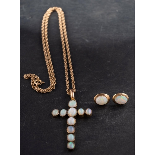 2633 - An opal, cruciform pendant and opal ear studs, the pendant stamped '9CT'; the ear studs with post fi... 