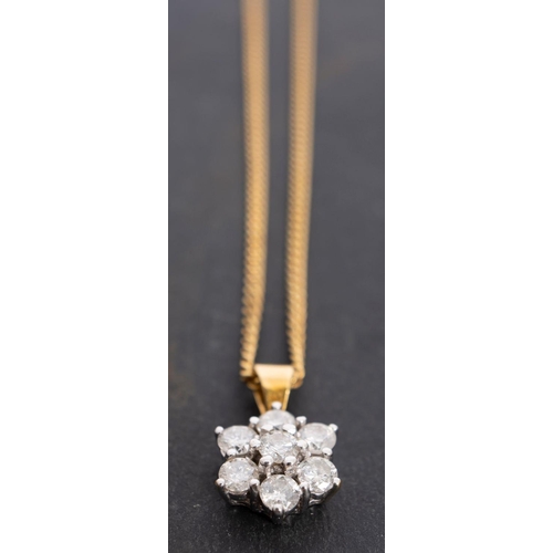 2720 - An 18ct gold, round, brilliant-cut diamond pendant, of flowerhead design, total estimated diamond we... 