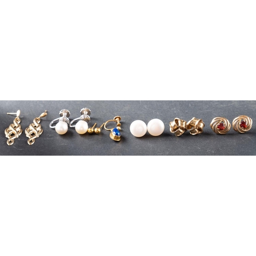 2744 - A small collection of earrings, including: a pair of knot ear studs; a pair of knot ear studs with o... 