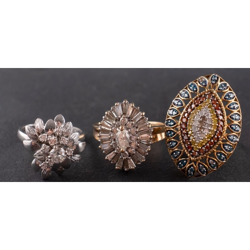 2748 - Three diamond rings, including an 18ct gold, flowerhead ring, total estimated diamond weight ca. 0.5... 