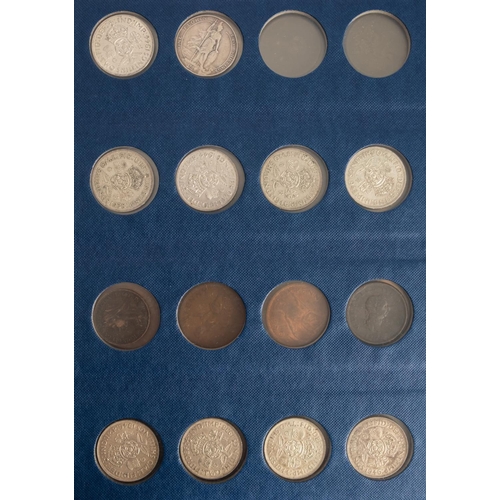 106 - An album of mixed coins including pre-1947 silver etc.