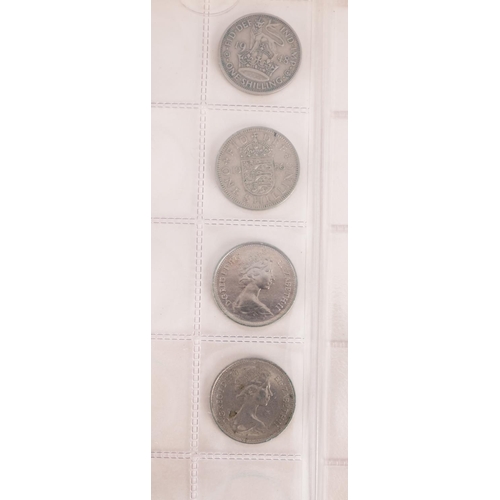 108 - Two albums containing mixed coins.