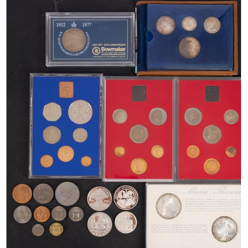 123 - A collection of boxed coins and sets including silver, 1974 Iceland, two Maria Theresa Thalers, 2005... 