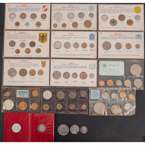 127 - Mixed world coin sets including silver 1915 Portuguese Escudo, 1899 Portuguese 100 reis etc.