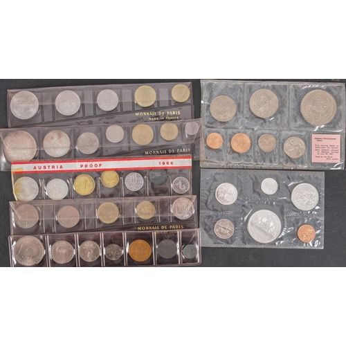 127 - Mixed world coin sets including silver 1915 Portuguese Escudo, 1899 Portuguese 100 reis etc.