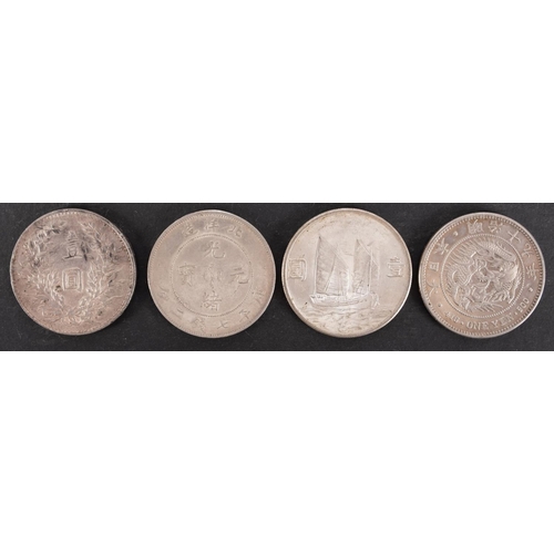 139 - Four Chinese Crown size silver coins, one with pin holes, average weight approx 26.9gms.