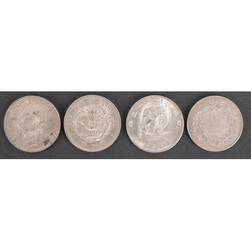 139 - Four Chinese Crown size silver coins, one with pin holes, average weight approx 26.9gms.