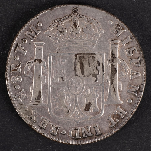 140 - A 1788 Counter marked Spanish pillar dollar, oval mark with George III lead Mexico Mint.