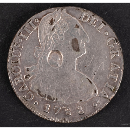 140 - A 1788 Counter marked Spanish pillar dollar, oval mark with George III lead Mexico Mint.