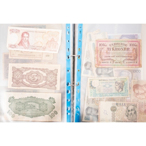 169 - An album of world banknotes.