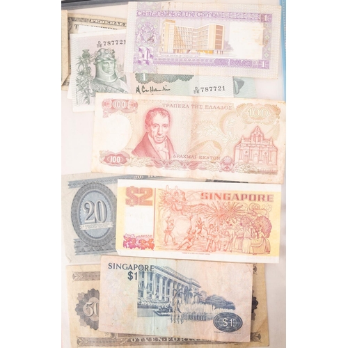 169 - An album of world banknotes.