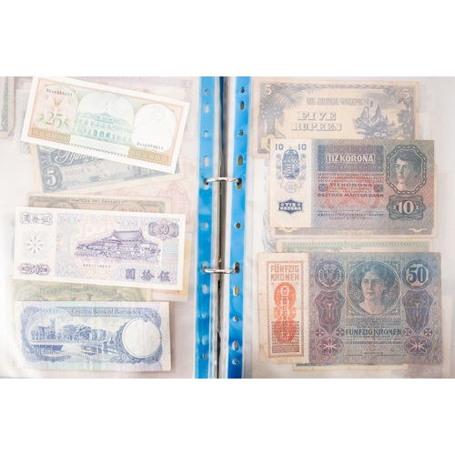 169 - An album of world banknotes.