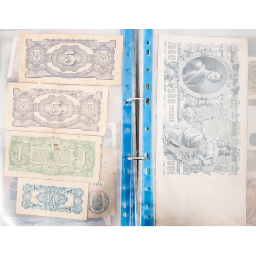 169 - An album of world banknotes.