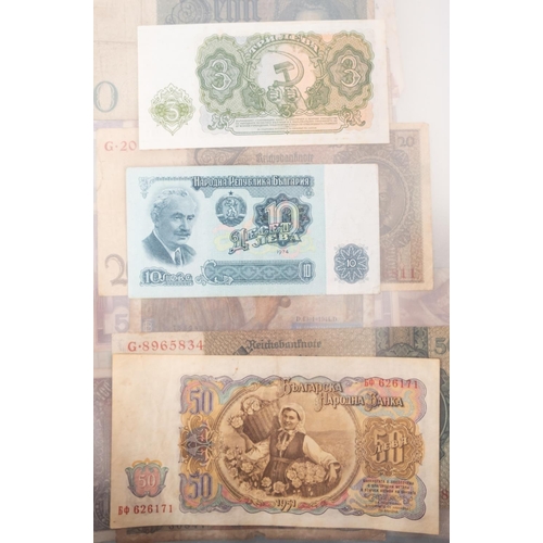 169 - An album of world banknotes.