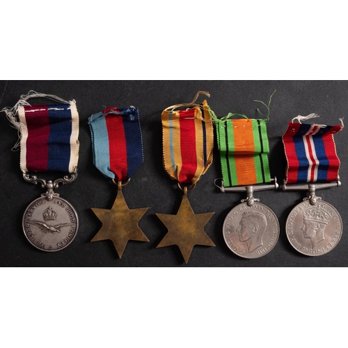 180 - A WWII RAF group of five '244594. Cpl  C. S. Wright RAF', 1939-45 Star, Africa Star, War Medal, Defe... 