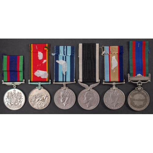 198 - A  group of five WWII medals, comprising Africa Service Medal, Australia Service Medal, New Zealand ... 