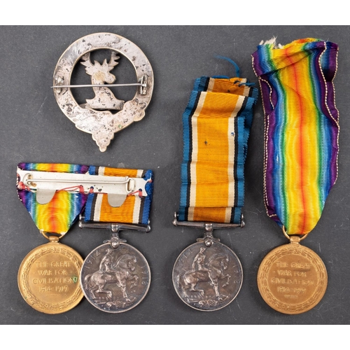 205 - Two WWI pairs. '3385 Pte  F H Barrett Devon R' with silver plated Hutchinson family crest brooch, '2... 