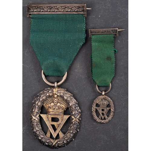 227 - A Victorian Volunteer Officer's Decoration, maker R & S Garrad & Co, London, 1892, together with cor... 