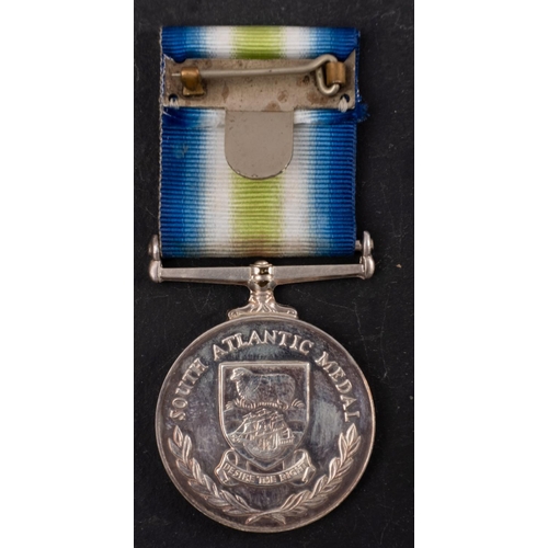 255 - A South Atlantic 1982 Medal with rosette to D153837N T.C. Ball, WEM (R) HMS Broadsword in card case ... 