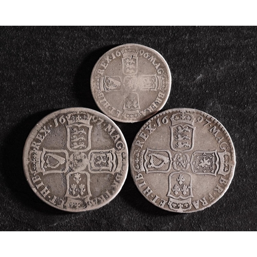 26 - A William III halfcrown (1697 (y) and a halfcrown 1697 and an Exeter Mint Shilling, 1696.