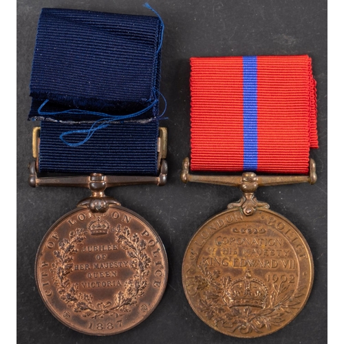 264 - A City of London Police Jubilee Medal 1897 with clasp to 'PC 599 A Inch' together with a City of Lon... 