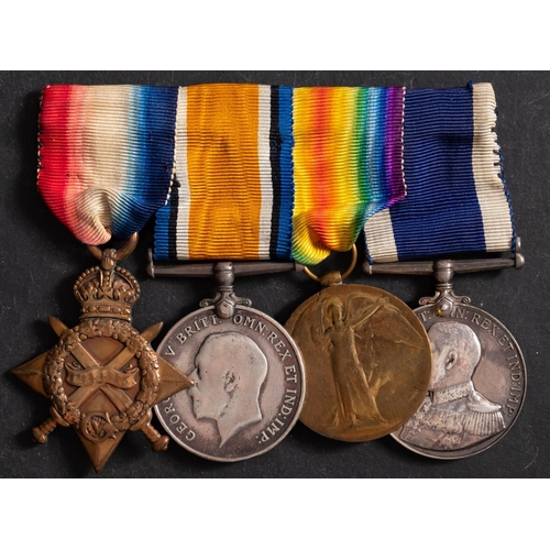 283 - A WWI group of four to 'J23119 D. L. Wilbourne, LS, HMS Carysfort', 1914-15 Star, War Medal, Victory... 