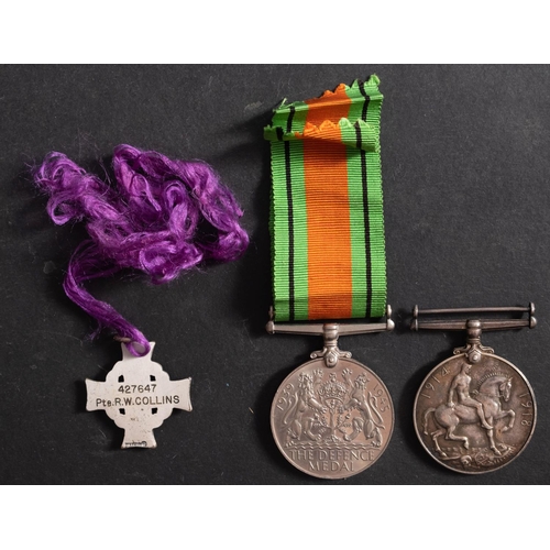 298 - A George VI Canadian Memorial Cross to '427647 Pte. R.W. Collins,' in case of issue, together with a... 