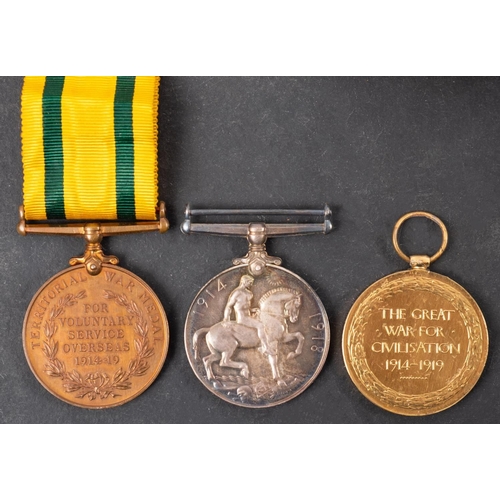 323 - A WWI trio to '329390 Gnr W C R Peacock RA', War Medal, Victory Medal and Territorial Force War Meda... 